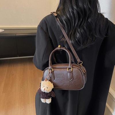 Sac de bowling rétro pour femme Maillard: Sac à main polyvalent et tendance automne/hiver pour un usage à une épaule ou en bandoulière.