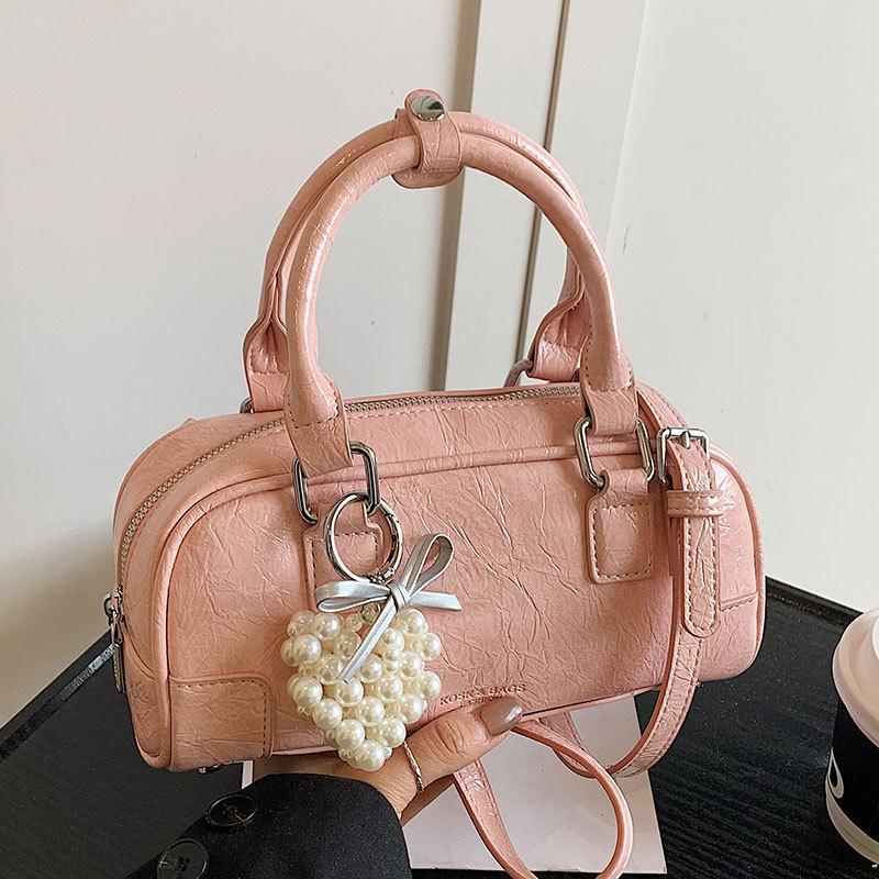 Niche simple portable bowling bag women's new versatile fashion messenger pillow bag