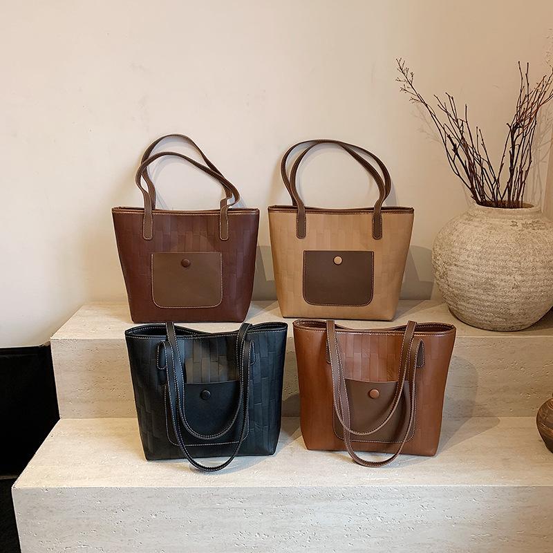 Retro texture work new fashion casual large capacity student shoulder underarm tote bag women