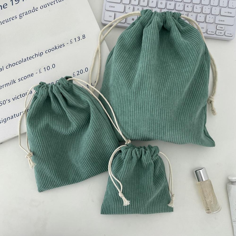 Einfarbige Kordelzug-Kosmetiktaschen aus Corduroy Weihnachtsgeschenkverpackung Aufbewahrungstasche Reise-Kosmetik-Lippenstift-Make-up-Organizer-Beutel