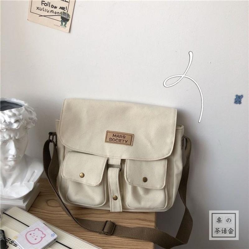 

Japanese Harajuku Tooling Crossbody Bag Female, Korean ins Vintage Student Canvas Bag Art Academy Wind Mail A single bag without pendant