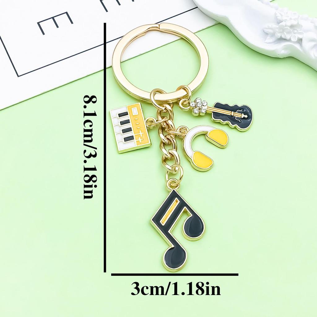 Antique Silver Music Cassette & Saxophone Keychain with Creative Design