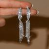 Light Luxury Fashion Full Diamond Tassel Earrings with High-end and Personalized Design Earrings for Women