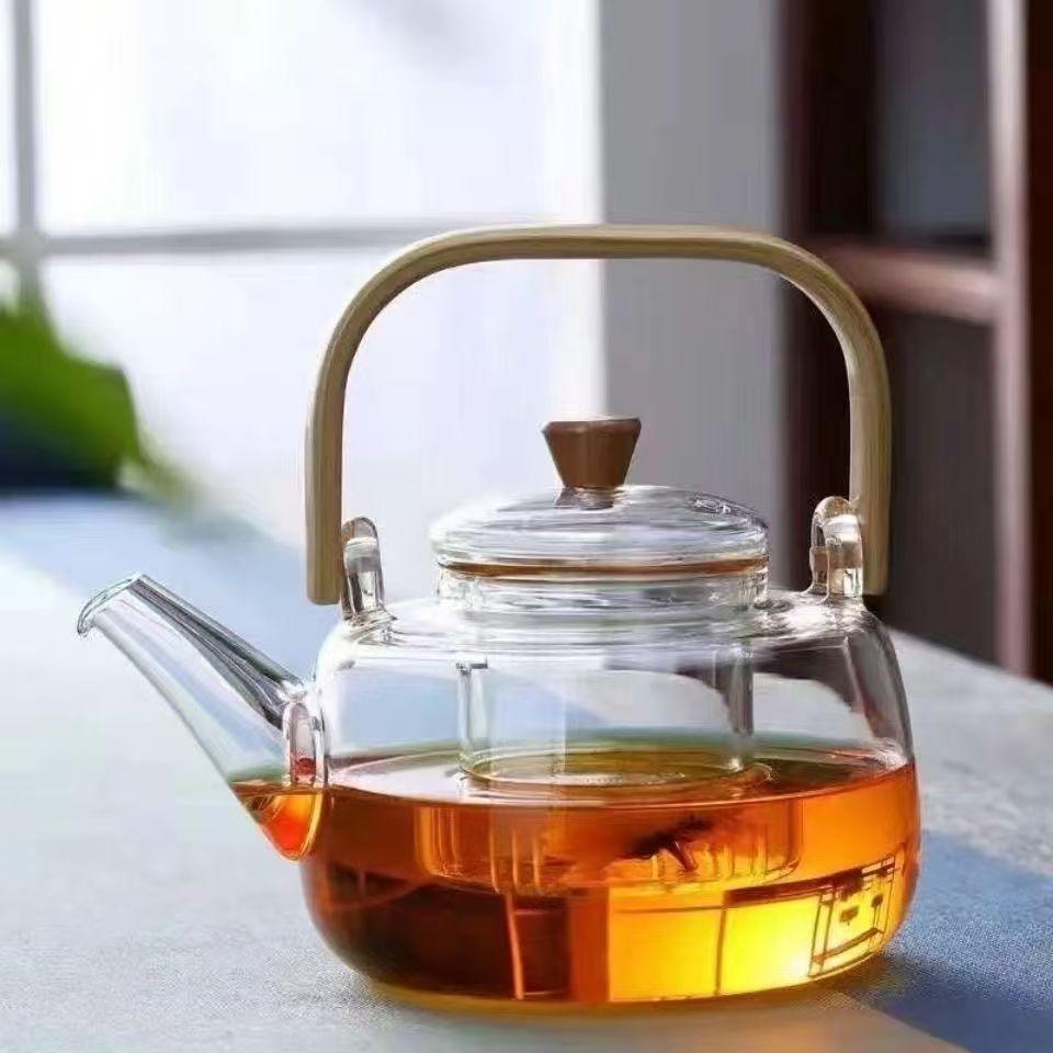 Nuova teiera in vetro borosilicato ad alta capacità resistente al calore per la preparazione del tè