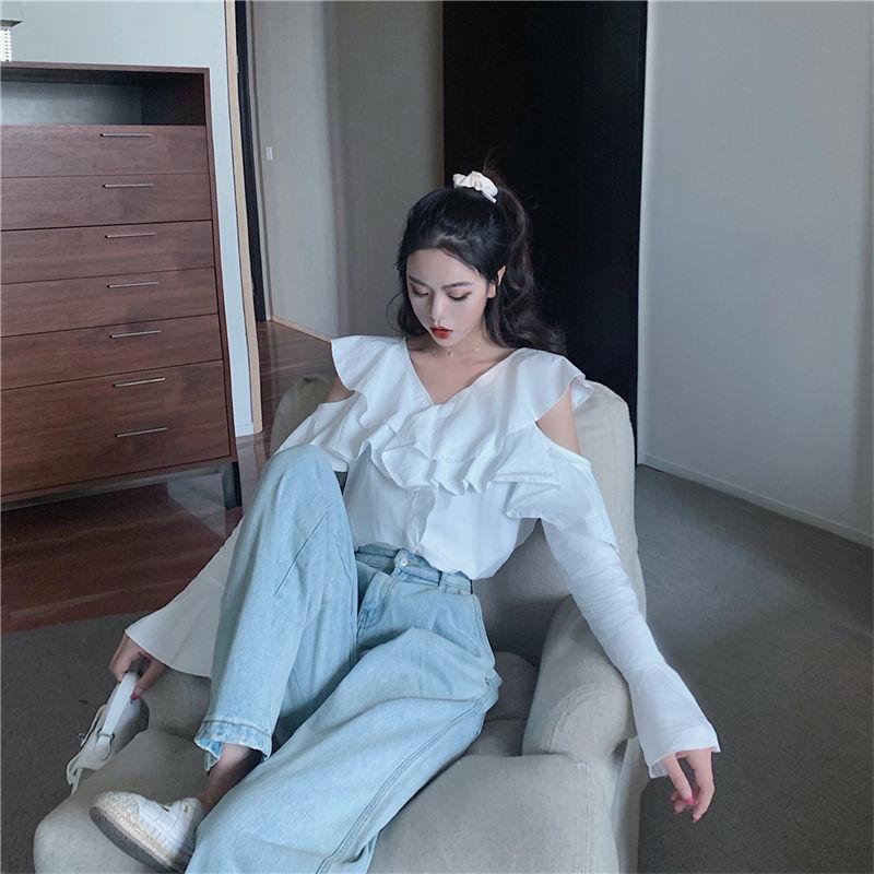 Autumn new flared sleeve shirt women's V-neck ruffle edge shirt pure desire wind hollow off the shoulder loose and thin top