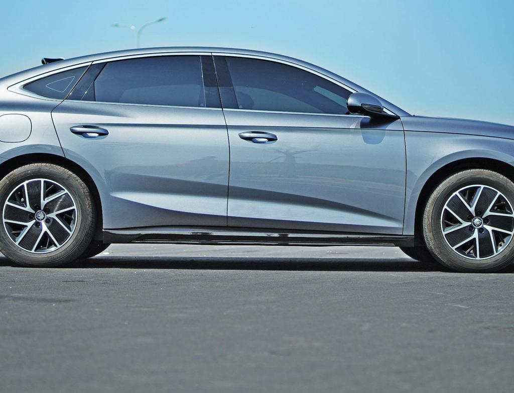 BYD Qin L DMi 24 Body Kit: Side Skirts, Front Bumper, Rear Bumper, Rear and Roof Spoilers.