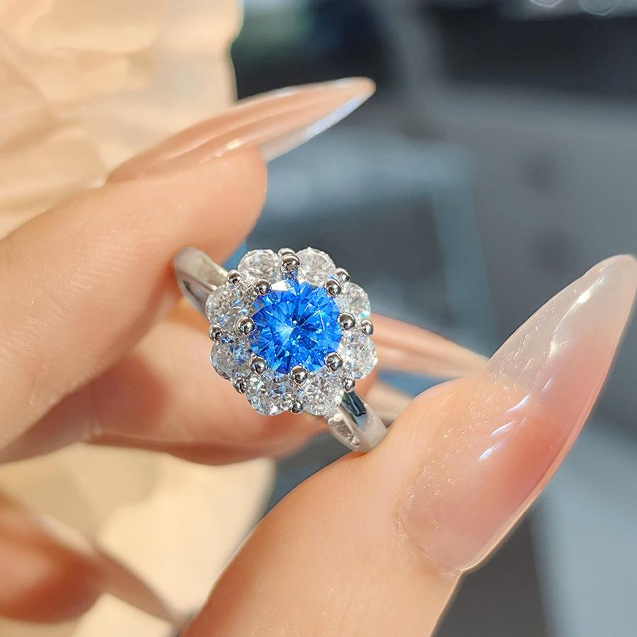 

Fashion Light Luxury Bud Color Treasure Set, High Carbon Diamond Blue Diamond Pendant, Plum Blossom Ring, Simple Daily Stud Earrings For Women