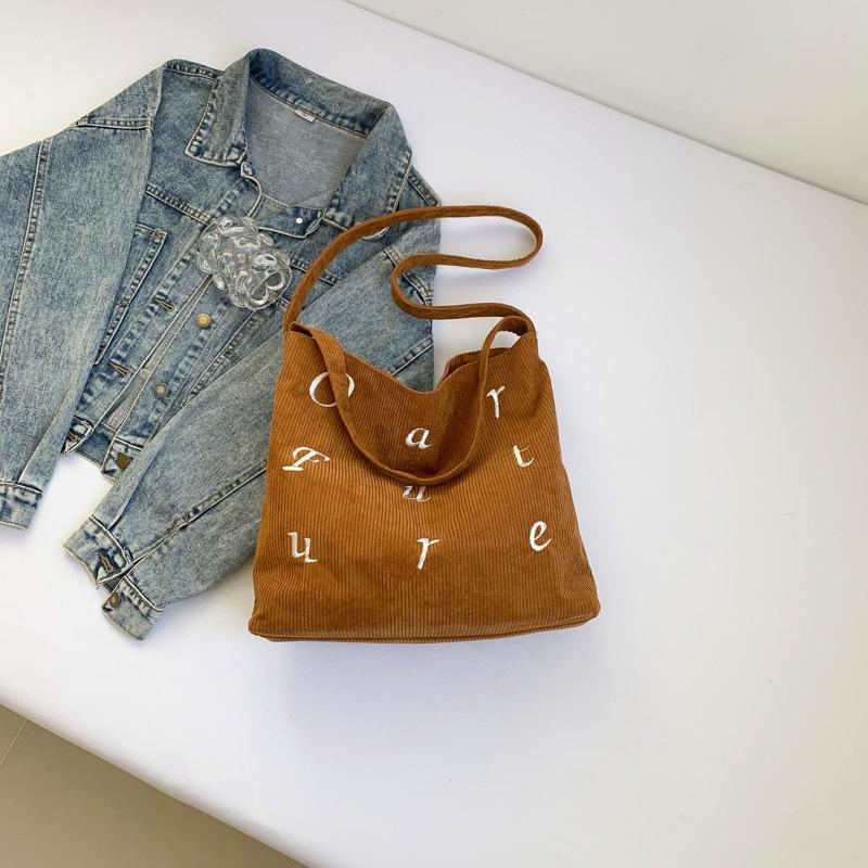 

Casual niche design alphabet handbag bag 2024 new fashionable retro beautiful lazy style underarm shoulder bag коричневий