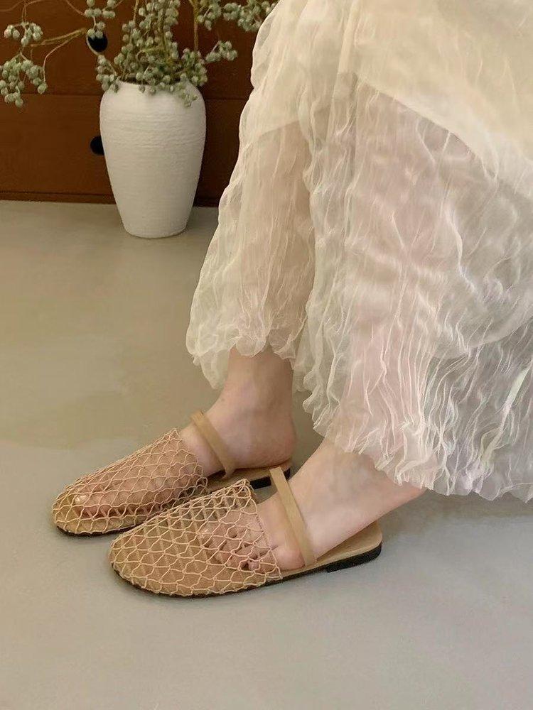 

Silver flat-bottomed bag head half slippers women s outer wear 2025 spring and summer new French temperament fairy Korean version of Muller sandals 40
