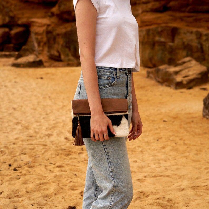 

Cowhide Leather Clutch , Leather handmade Bag