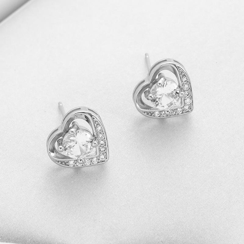 Europäischer und Amerikanischer Stil Vergoldetes Pfirsichherz Schmuckset: Kupfer-Mikro-Inlay Zirkon Ohrringe, Halskette und Ring.