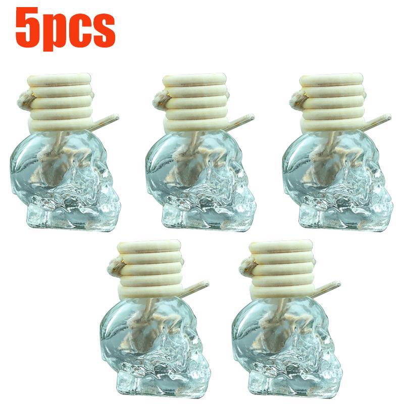 Auto-Lufterfrischer-Diffusor, Aromatherapie-Flasche mit ätherischen Ölen, zum Aufhängen, transparente Totenkopf-Parfümflasche, reinigendes Autozubehör