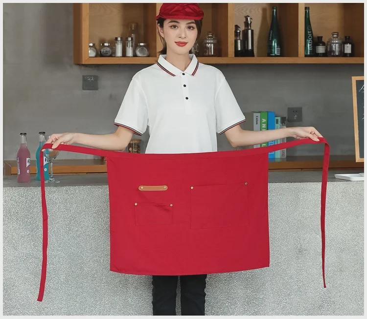 Unisex vanntett kjøkkenforkle i kanvas med halvlangt design og logo i midjen