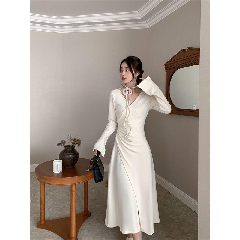 Fashion temperament Sexy Spice Girl V-neck long-sleeved dress Women's spring slim fit with a word long skirt