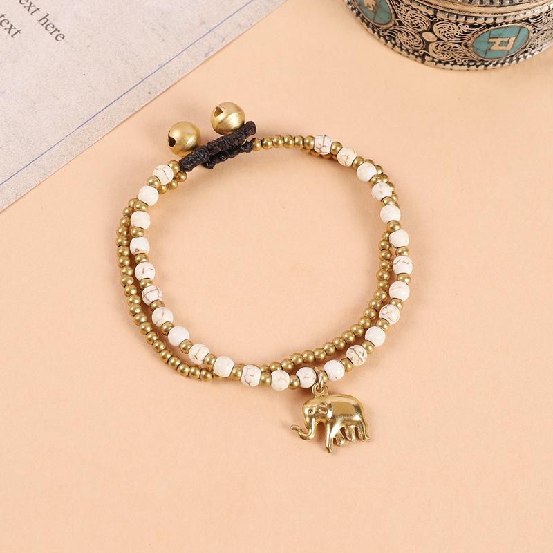 Ethnic Hand-Woven Elephant Bracelet: Bohemian Tibetan Style with Vintage Double Beads and Bell Charm for Women