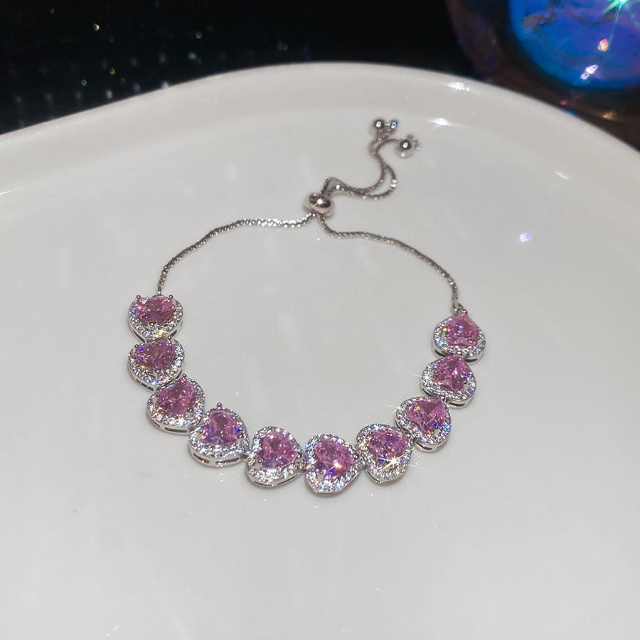 Pink Diamond Zirconia Starburst Flower Bracelet: Trendy, Luxurious Jewelry with Unique Design.