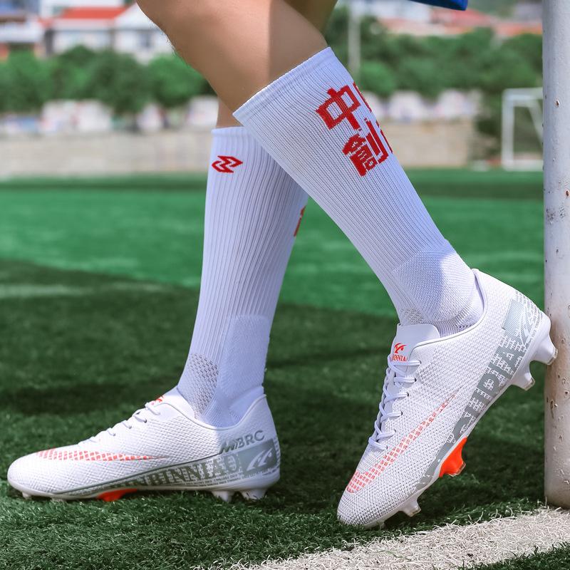 Autumn new printed hard-soled men's and women's long and short nail shoes low-top fashion football shoes grass training shoes