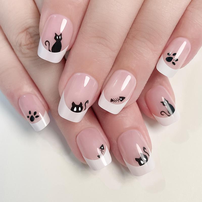 

Spooky Halloween Nail Art: Bat, Pumpkin & Ghost Designs - Black Manicure Tips
