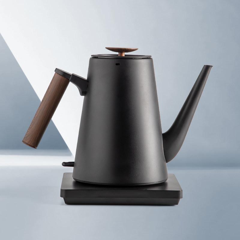 Youmingtang Black & White Electric Kettle: Fast Boiling for Home, Tea Brewing, Water Heating, and Hotel Use.