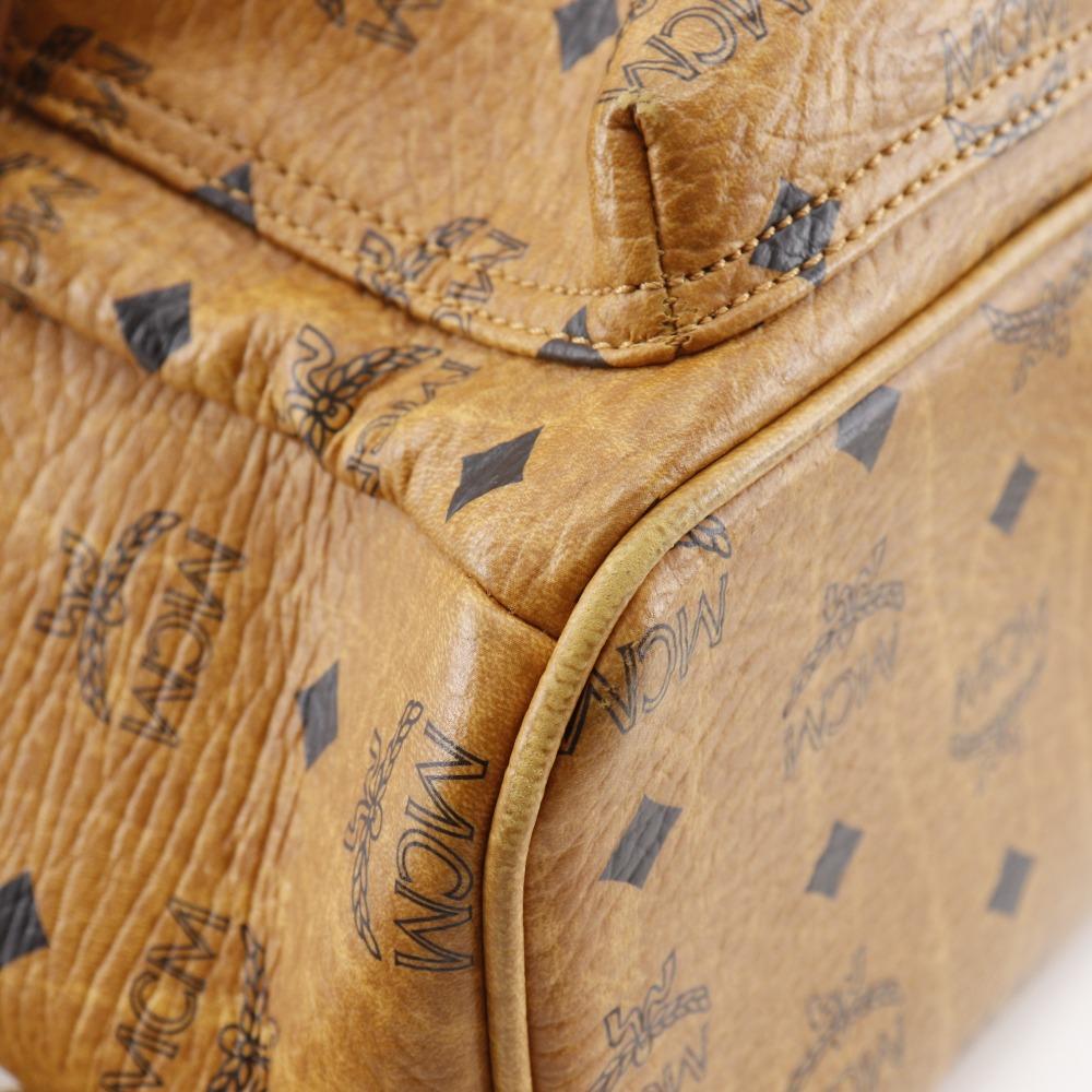 MCM Logogram Rucksack Tagesrucksack MMK2AVE20 Kleine Nieten Braun PVC Damen Gebraucht