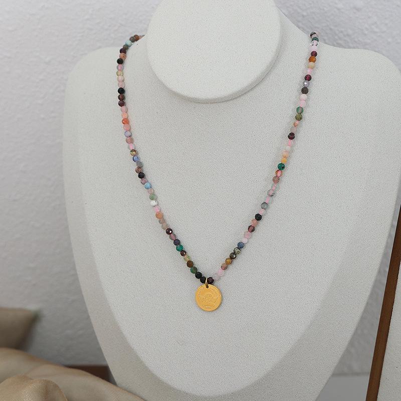 European-American Niche: Blue Spirit Grey Natural Stone Handmade Necklace with Starry Sky Glaze Angel Pendant in Gold-Plated Titanium Steel.