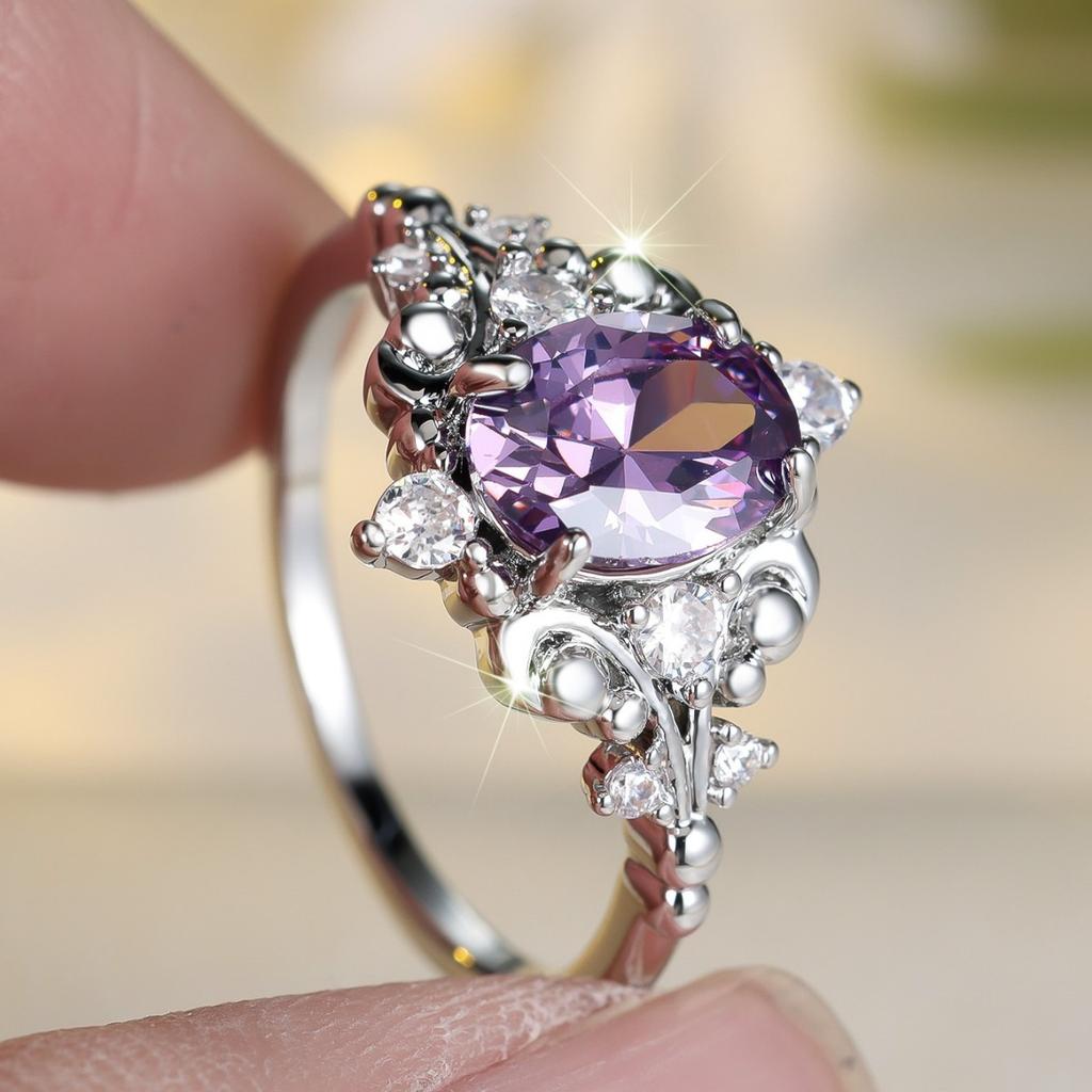 Elegant formal occasion halo ring with a curved metal frame and dazzling inlay details, a high-end accessory for women's engagement ceremonies and