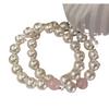 Original design, featuring a beaded pearl bracelet with natural Madagascar rose quartz beads