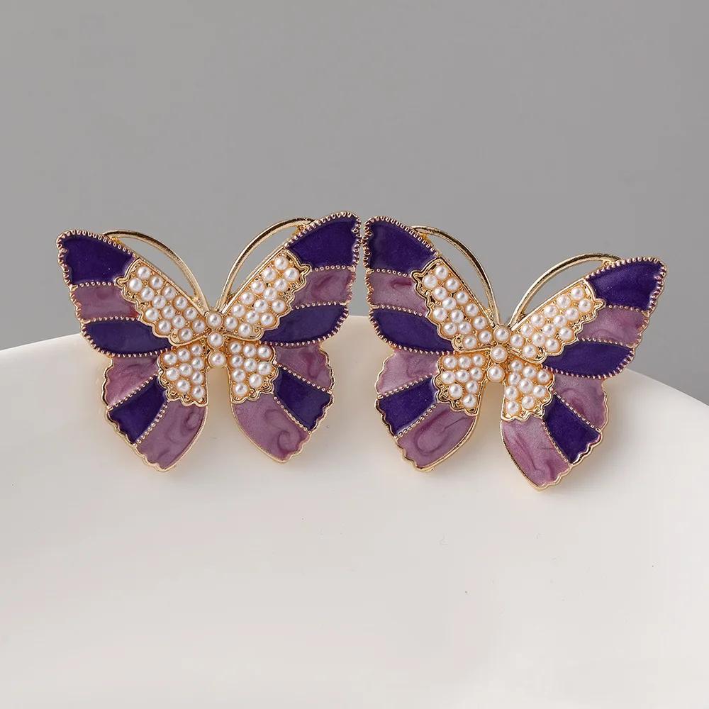 

Модные новые креативные серьги-гвоздики из сплава с каплями масла и бабочками для женщин, дизайнерские серьги с жемчугом для пригородных поездок, ювелирные украшения-подвески фиолетовый