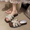 Pearl French holiday cool slippers women's summer wear 2025 new flat-bottomed non-slip with skirt gentle one-word slippers