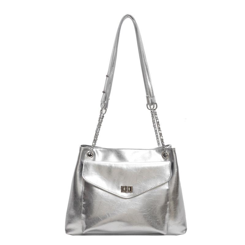 

Корейська версія великої жіночої сумки 2024 р. Нова приміська сумка універсальна модна проста приміська сумка через плече срібний