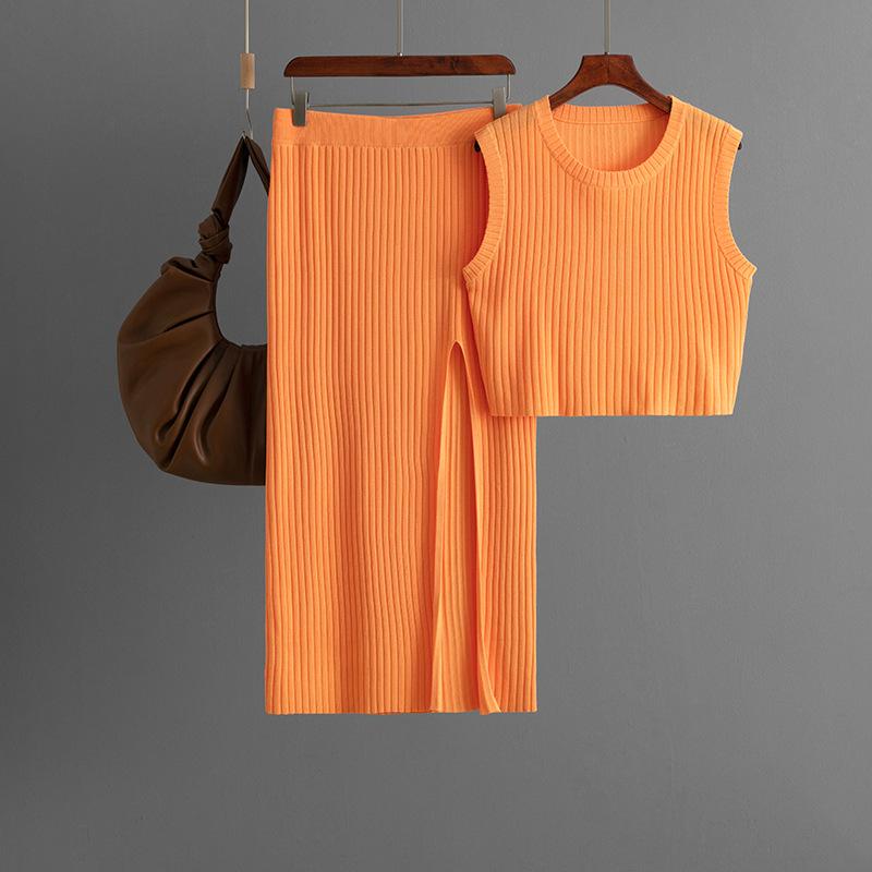 European and American solid color sleeveless vest fashion suit 2025 summer new knitted slit skirt two-piece suit