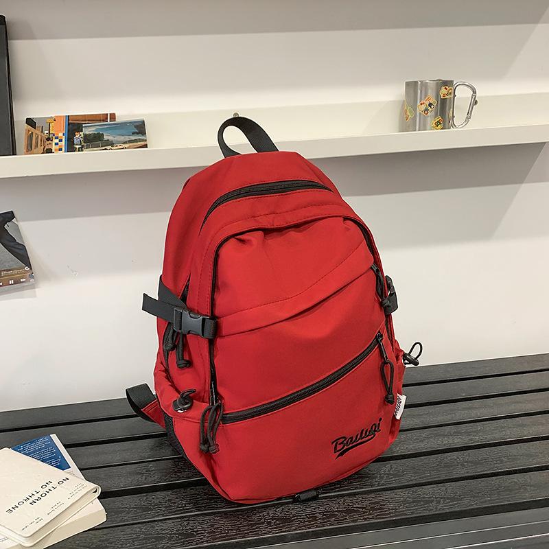 Schoolbag backpack Korean version solid color couple size travel backpack student large capacity anti-splashing light backpack wholesale