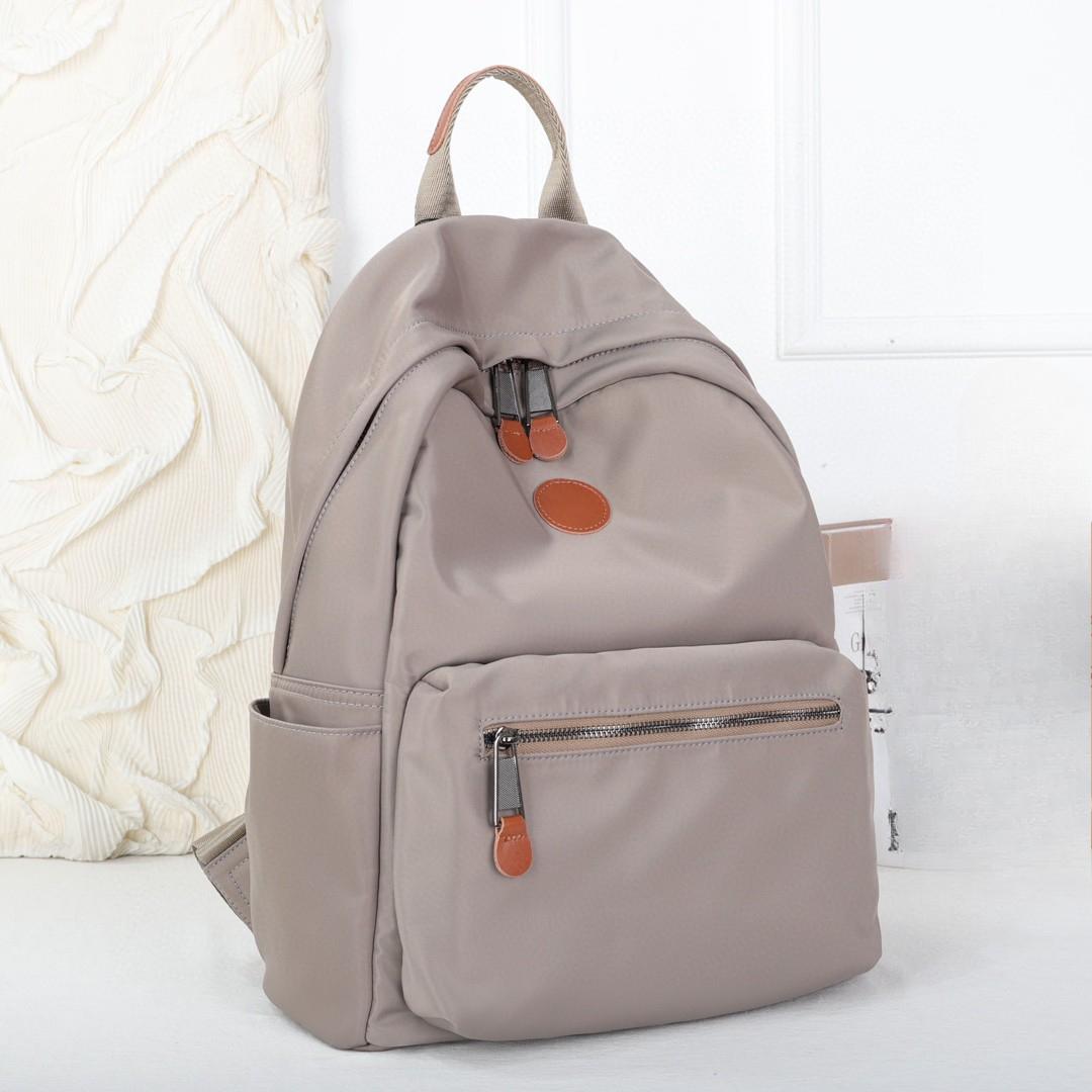 

Рюкзак из ткани Оксфорд, женский, легкий, для путешествий, для компьютера, водонепроницаемый, простой, школьный рюкзак из холста 40 * 30 * 18CM