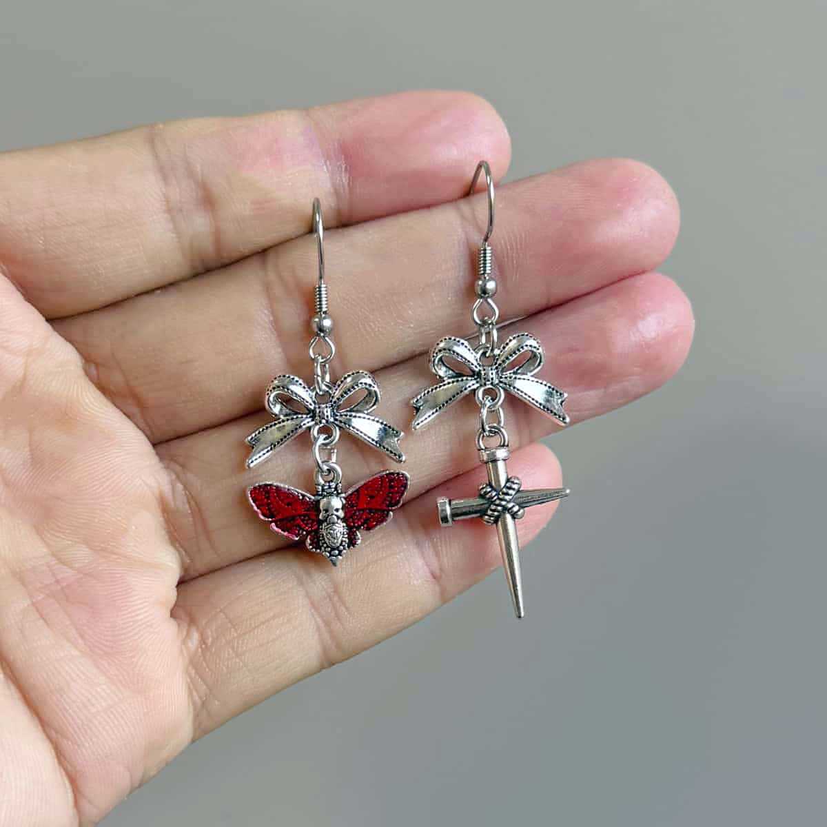 

Gothic Sliver Color Stainless Steel Bowknot Nail-cross Moth Skull Head Asymmetric Dangle Earrings for Women Halloween Jewelry