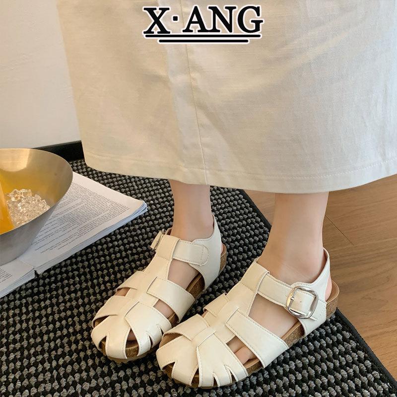 

Leather woven bag head sandals women s 2025 new summer thick-soled pig cage shoes hollow hole shoes Roman women s shoes 40