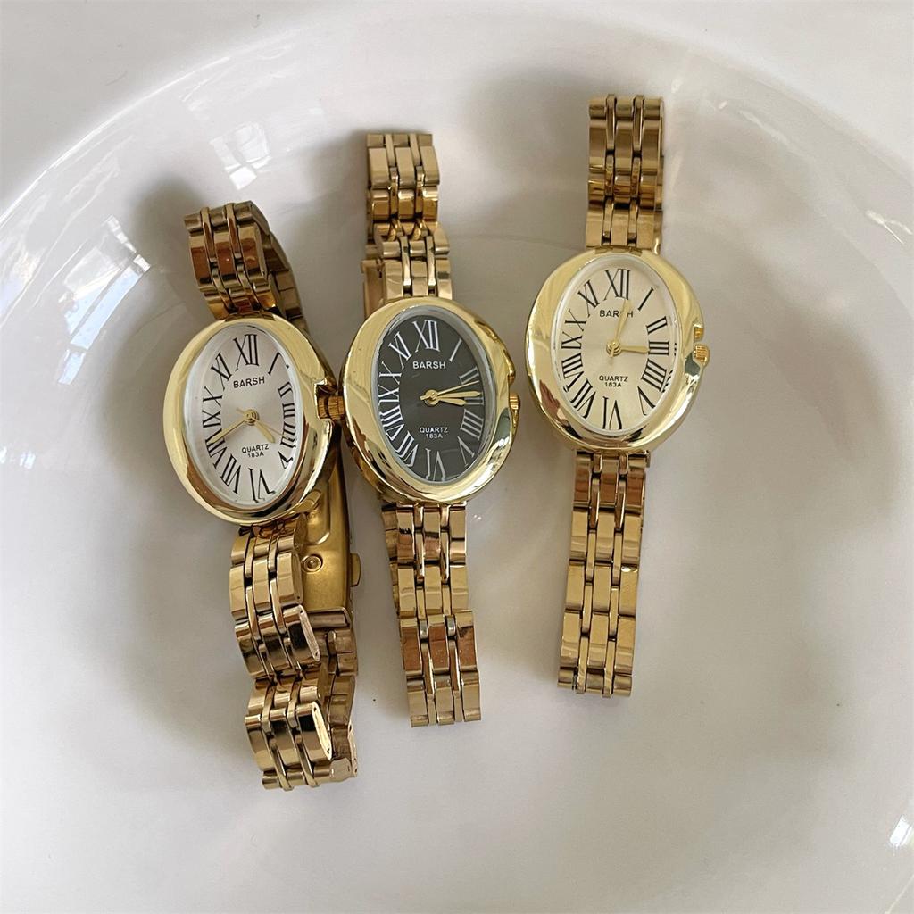 Retro gold women's watch, fashionable oval shaped temperament, steel strap, quartz watch