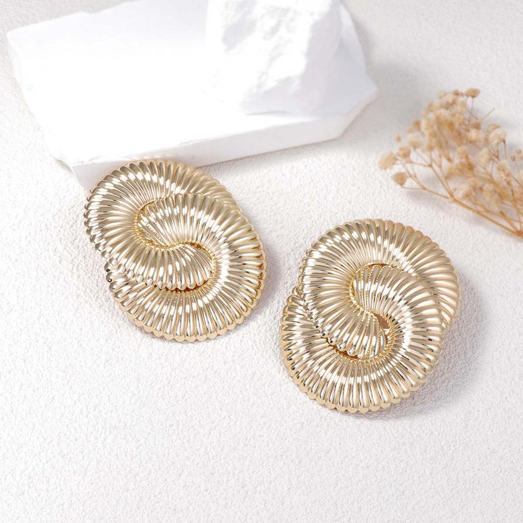 Exaggerated and powerful metal twisted spring wavy stud earrings for ladies, versatile and trendy street style for women