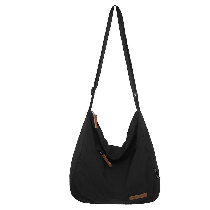 Women's bag Large capacity canvas bag Premium portable messenger simple tote bag Fashion versatile shoulder messenger bag