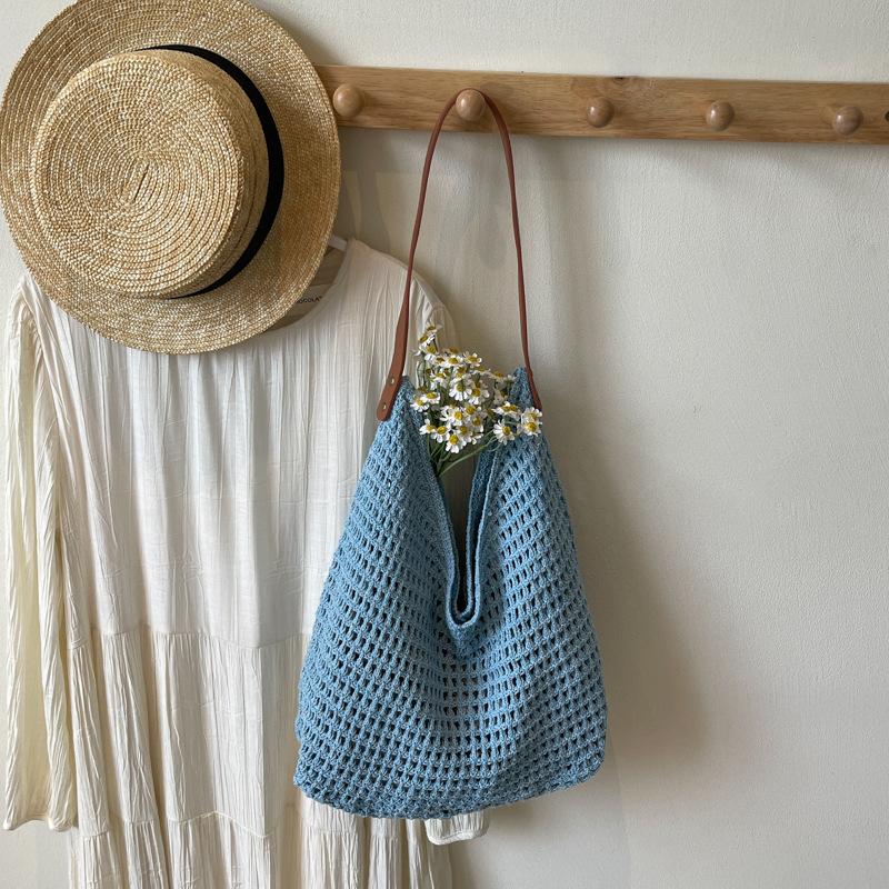 Lazy wind tote bag women's new niche high-end woven bag seaside vacation shoulder bag