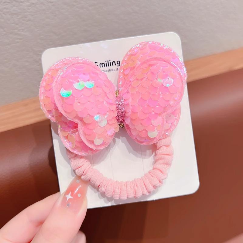 

Детская резинка для волос с пайетками в виде бабочки не повредит волосы. Идеально подходит для высоких хвостов или в качестве головного убора для девочек. Butterfly розовый