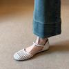 Sheepskin version~ French woven hollow design outer wear leather sandals women's word with camellia round head flats