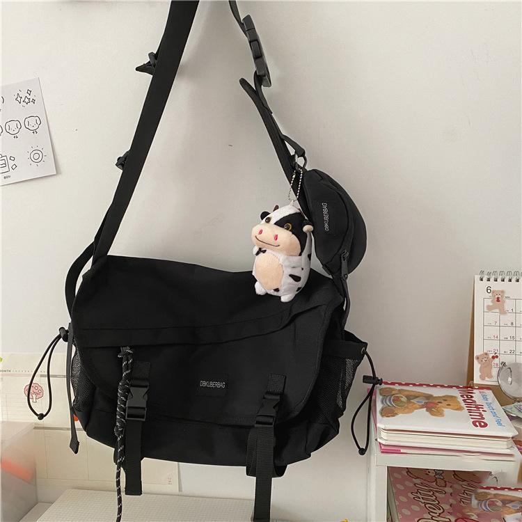 Japanischer Harajuku Tide und geschlechtsneutraler dunkel schwarzer Funktionsbeutel Koreanischer Ins Retro Werkzeug Messenger Bag mit großem Fassungsvermögen