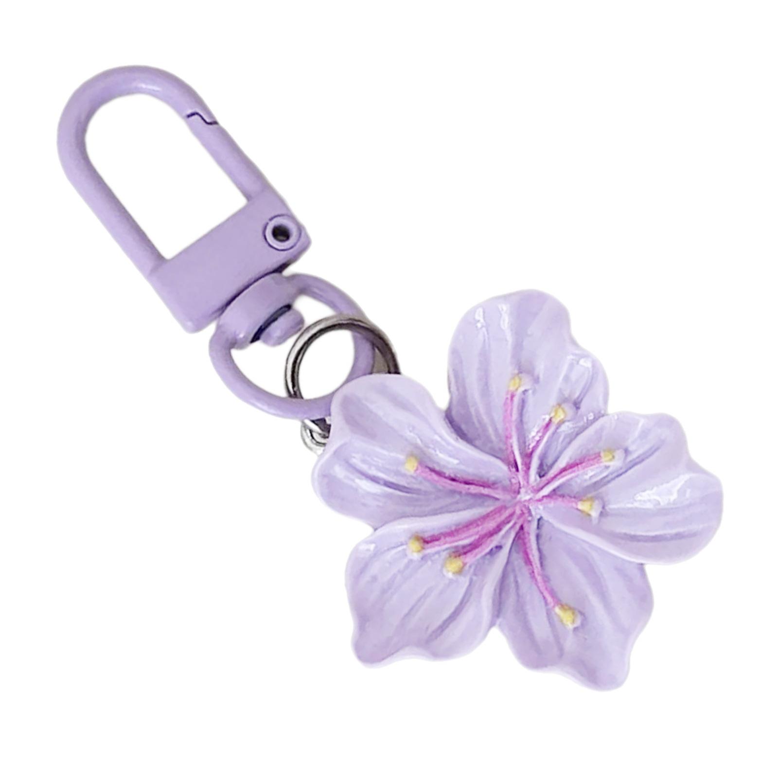 

Модный брелок для ключей в виде цветка, аксессуар, портативный держатель для ключей, трендовый шарм для сумки, акриловая текстура, подходит для любителей путешествий фиолетовый