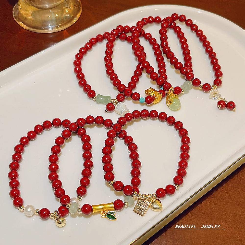 New design rock crystal elastic bracelet sweet temperament strawberry crystal bracelet jewelry girl.