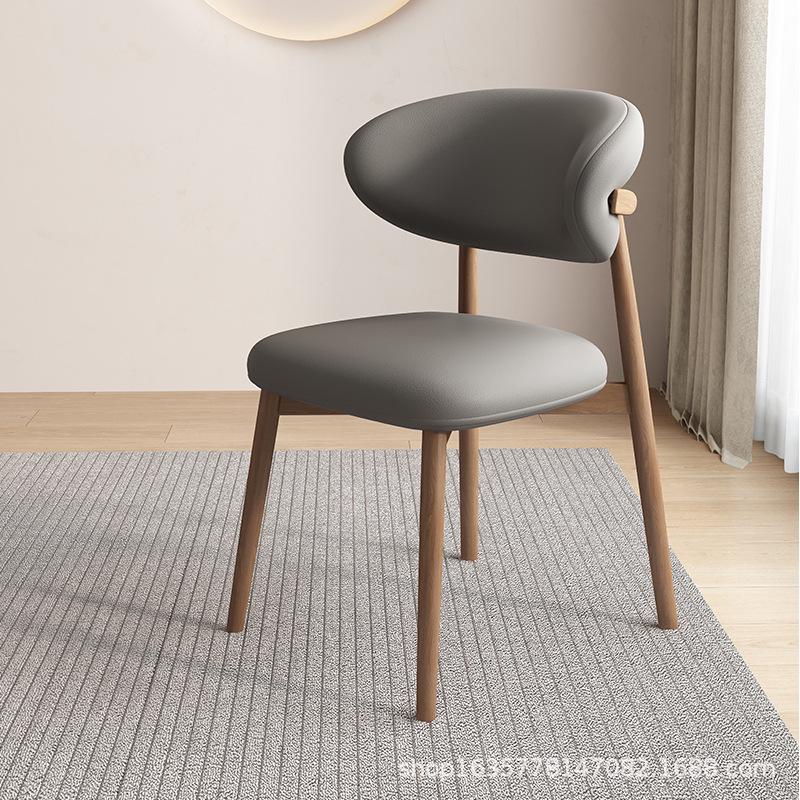 Nordic Modern Minimalist Solid Wood Dining Chair with Soft Pack Backrest - Comfortable Light Luxury Ram's Horn Design for Home, Restaurant, and Hotel.