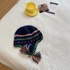 Hand-spliced color ear protection wool hat female cute rainbow knitted warm strap parent-child Lei Feng hat