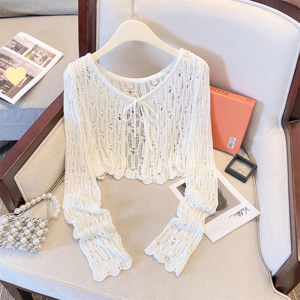 Hollow crochet knitted sweater women's summer outer shawl air-conditioning blouse short temperament gentle lace-up top