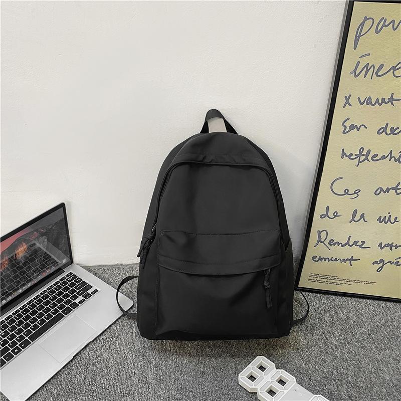Simple and large-capacity unprinted backpack casual men's and women's same backpack junior high school solid color student schoolbag