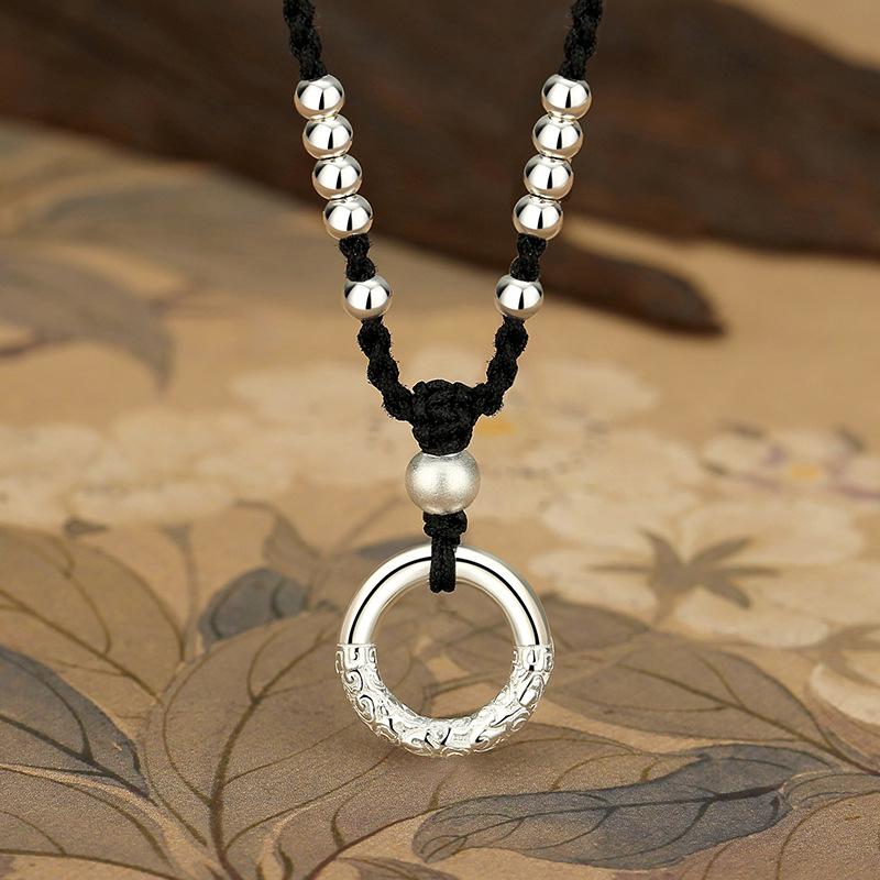 Auspicious Cloud 999 Sterling Silver Peace Buckle Couple Necklace with Black Rope - Retro Luxury.