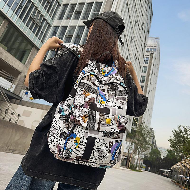 Schoolbag New Large Capacity Graffiti Backpack Multi-compartment High School Backpack Fashion Trend Travel Bag Men's and Women's